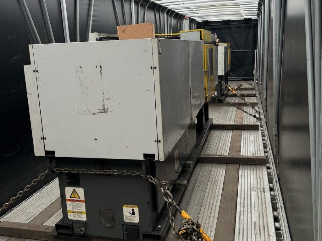 Industrial equipment secured for freight transport inside a trailer