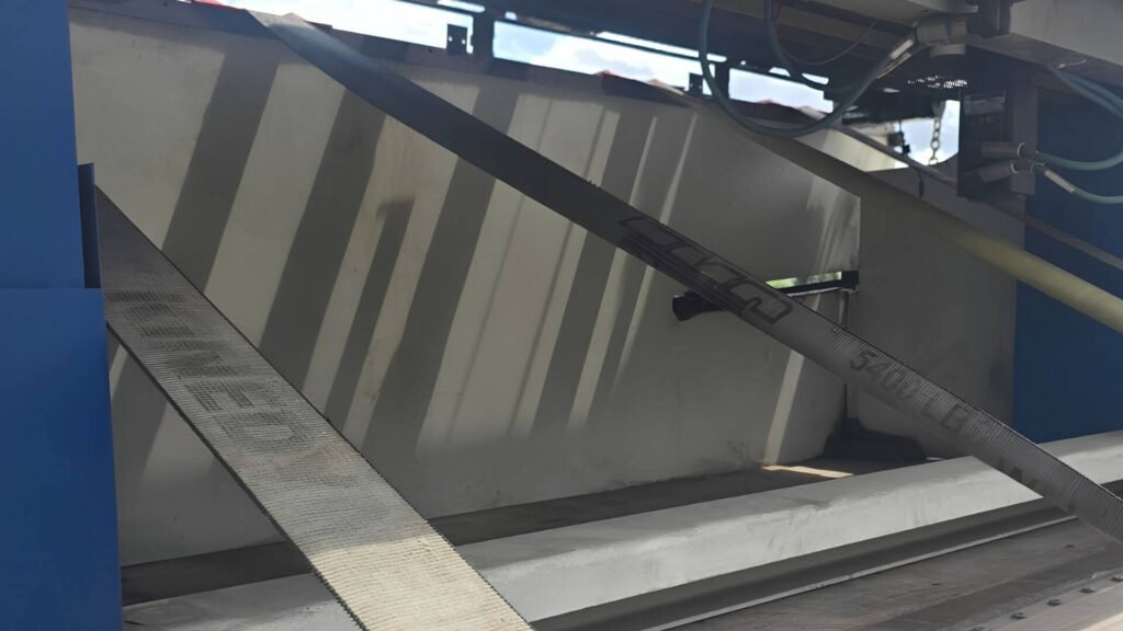 Press brake lower component tie downs for a Los Angeles to Houston machinery shipment Press brake lower component tie downs for a Los Angeles to Houston machinery shipment