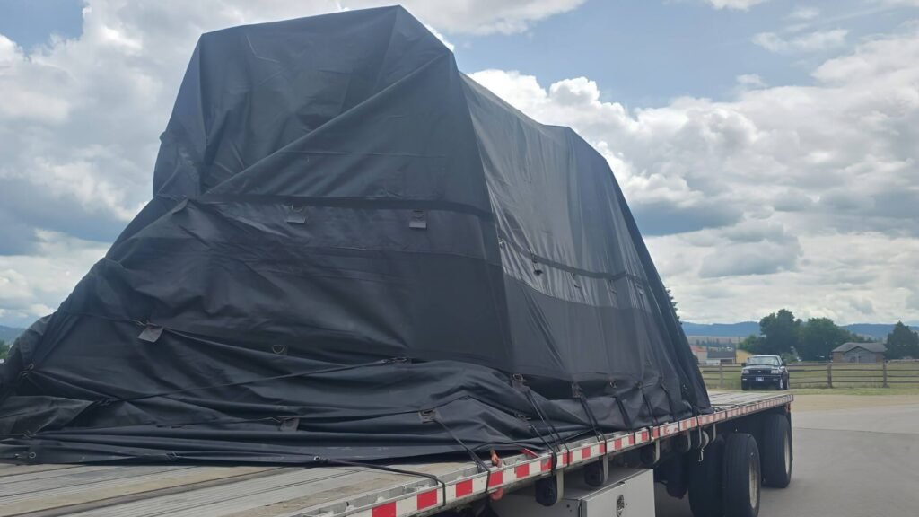 Tarped CNC press brake ready to ship from Los Angeles to Houston Tarped CNC press brake ready to ship from Los Angeles to Houston