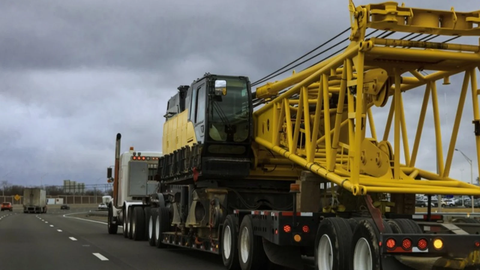 Crawler crane on a multi axle trailer heading to a jobsite