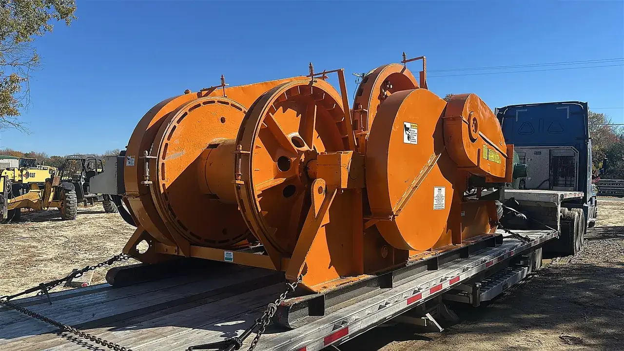 Orange cable reels on a flatbed