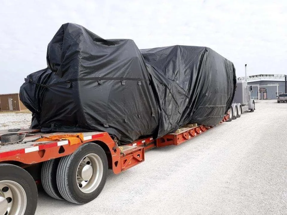 How to Ship an Oversize Tarped Machine on a Multi Axle Lowboy in Los Angeles How to ship an oversize tarped machine on a multi axle lowboy under permit from Los Angeles