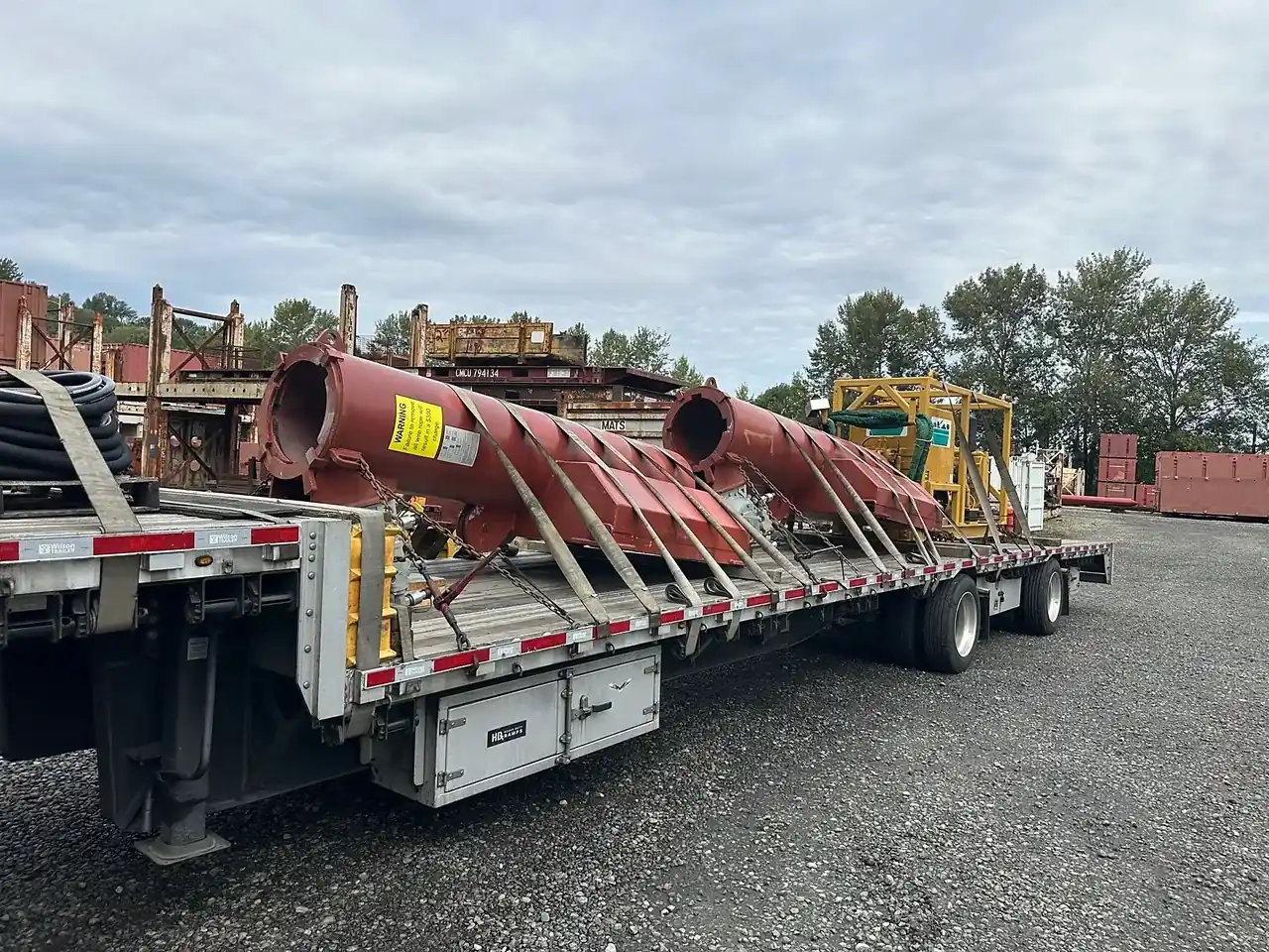 Red pipe sections on a flatbed
