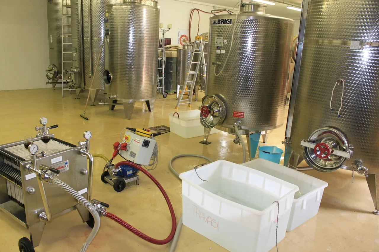 Stainless steel fermenters and a pad filtration machine