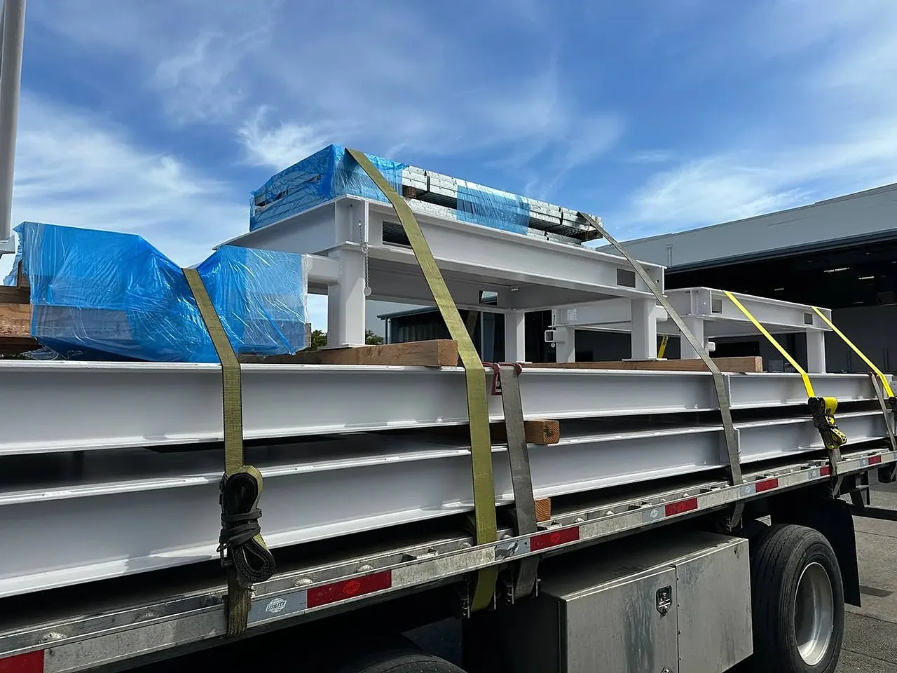 Steel beams strapped on a flatbed