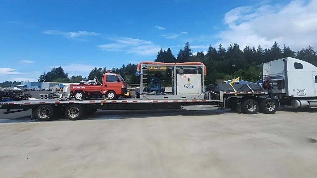 Partial truckload Step deck carrying freight for two shippers