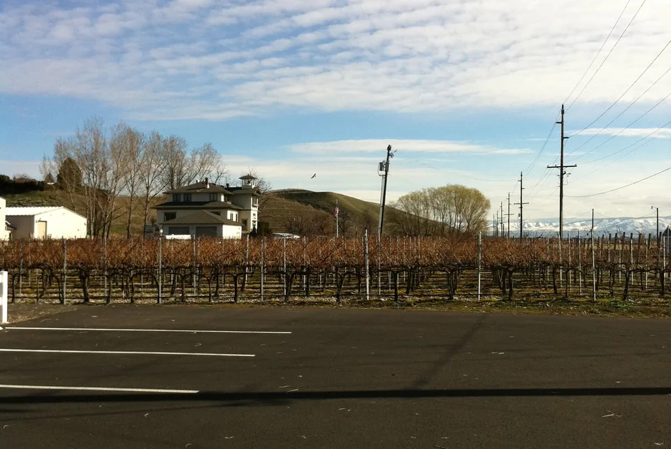 Winery and vineyard freight Vineyard rows and a winery in the Walla Walla Valley